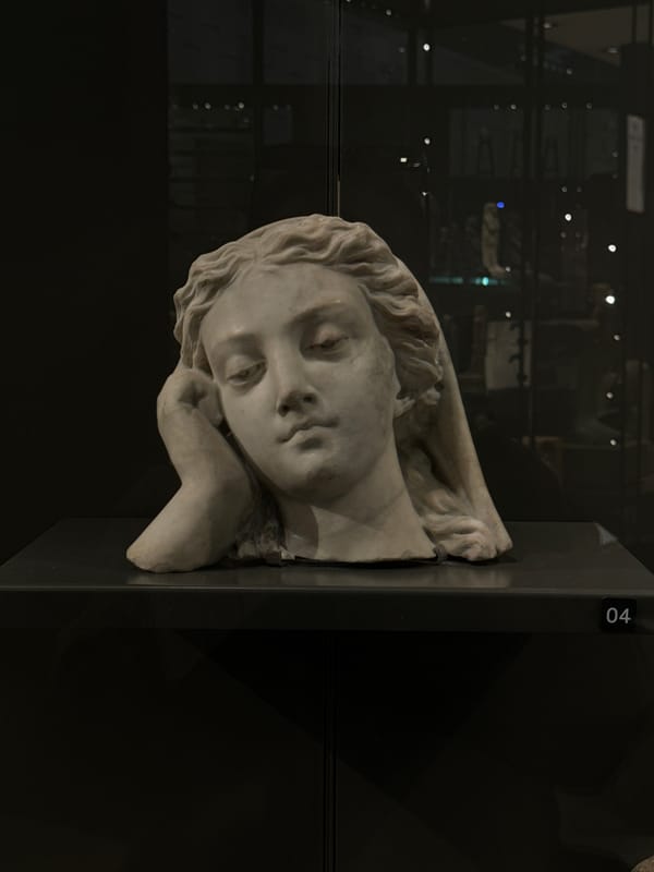 White marble sculpture observed in reclining pose, Egypt