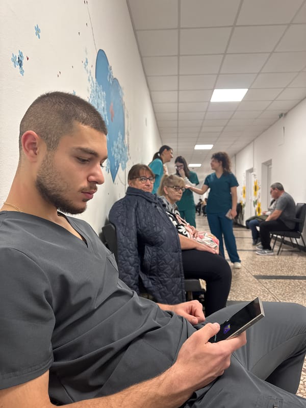 People wait in hospital hallway in Pleven, Bulgaria