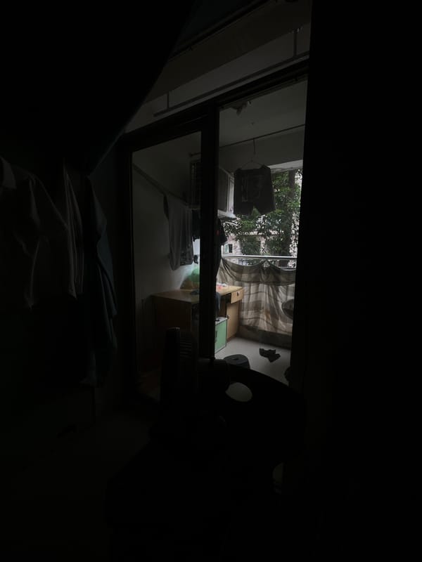 Dimly lit room interior captured in Yuzhong District