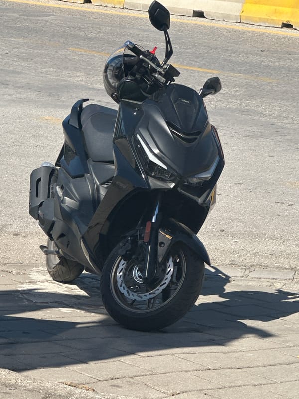 Motorcycle inspection routine documented in Fethiye, Turkey
