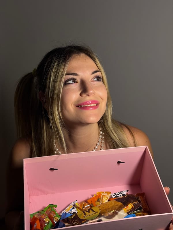 Woman opens gifts with colored lighting in Budva Montenegro