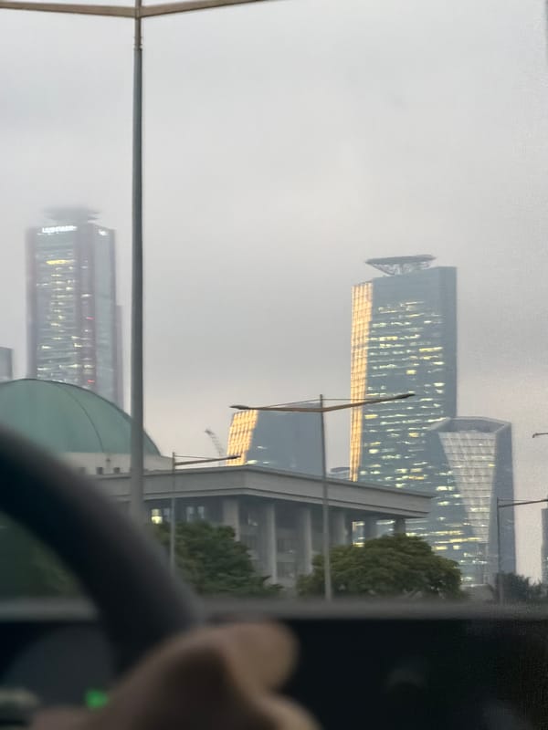 Urban view captured from vehicle in Seoul showing skyscrapers