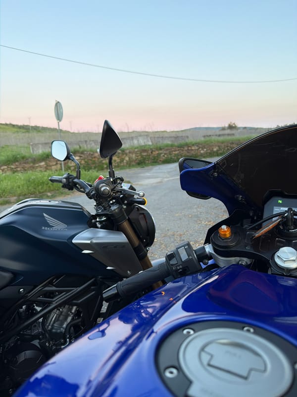 Motorcycle group ride through Mirandela Portugal at sunset
