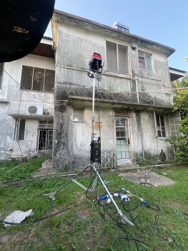 Film crew sets up professional lighting equipment in Lagos