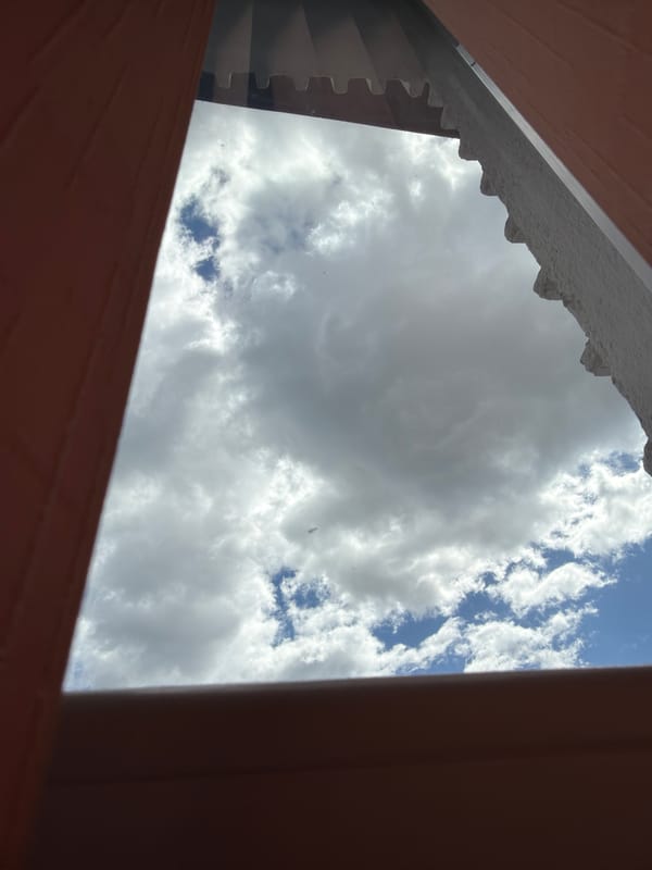 Morning sky viewed through building frames in Velingrad