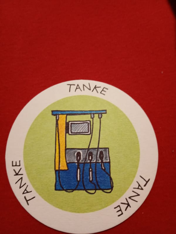 Educational game tokens with German illustrations documented in Rosenheim