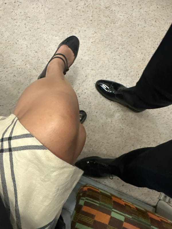 Two people spotted indoors with sofa in London