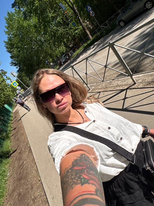 Woman photographed lying on sidewalk in Perm, Russia