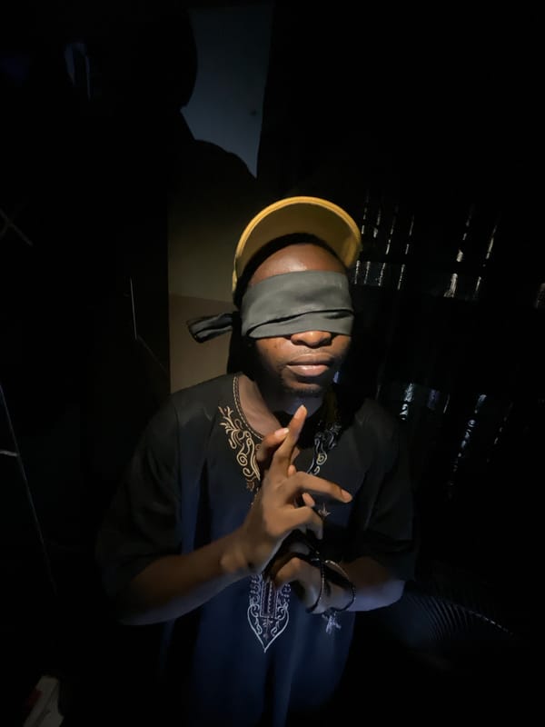 Blindfolded man photographed multiple times in Lokoja, Nigeria