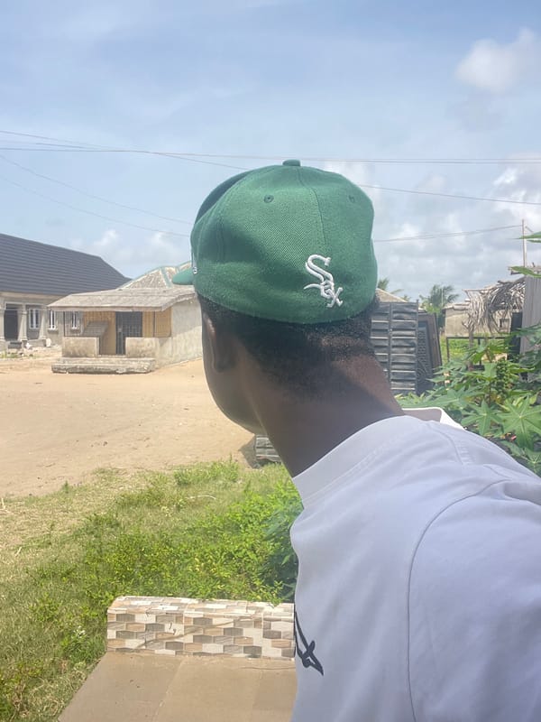 Young man photographed in multiple locations around Badagry, Nigeria