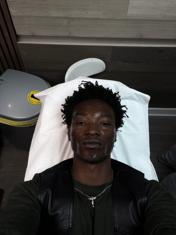 Person receives facial treatment at London spa facility