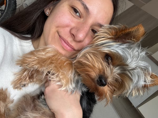 Woman poses with fluffy dog in Varna