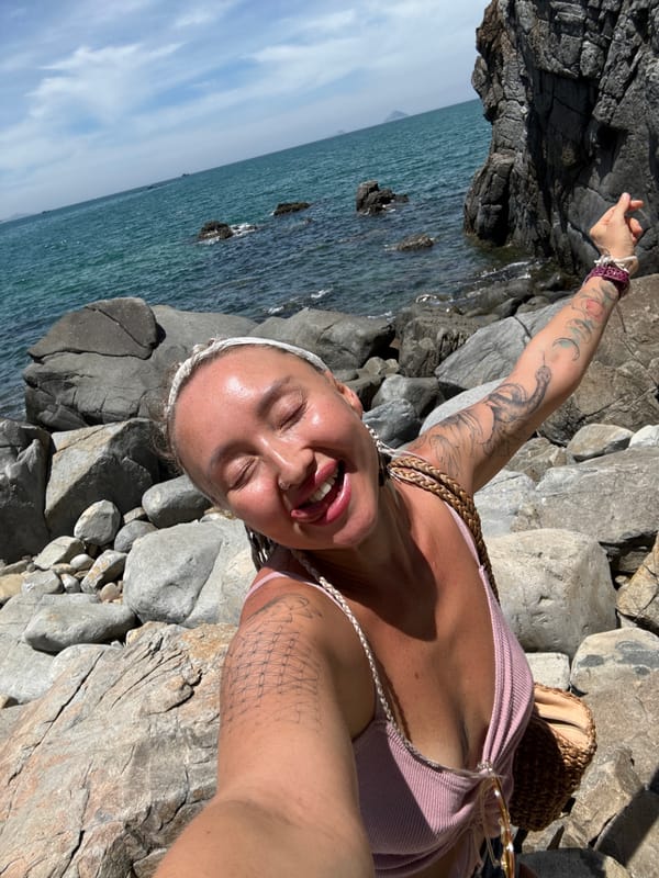 Silly beach selfie at rocky Vĩnh Lương coastline