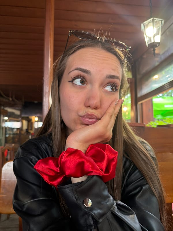 Couple enjoys casual lunch at Bulgarian restaurant with cat