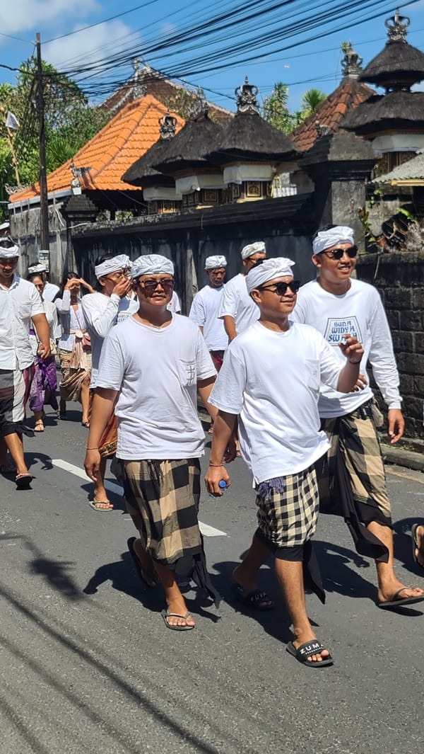 Traditional procession through Denpasar streets, Bali