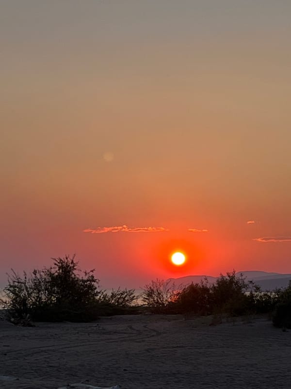 Vivid sunset over sandy terrain in Krasnoturansk, Russia