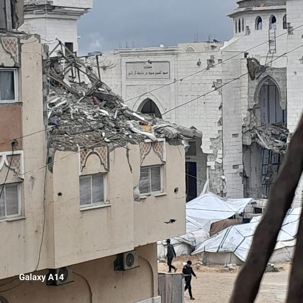 Community food distribution documented in damaged Khan Yunis neighborhoods