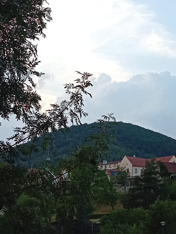Evening stroll through Tišnov's hilltop park near St. Wenceslaus tower