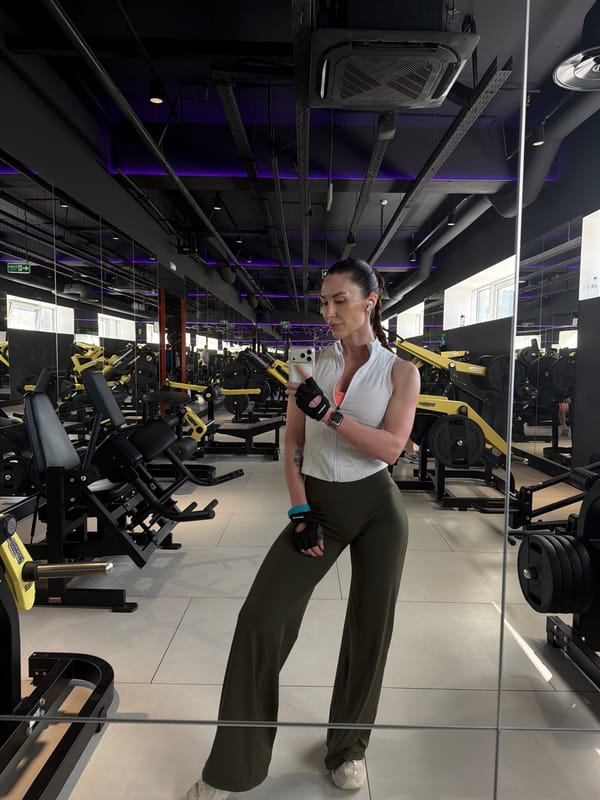 Woman takes gym selfie in mirror in Perm