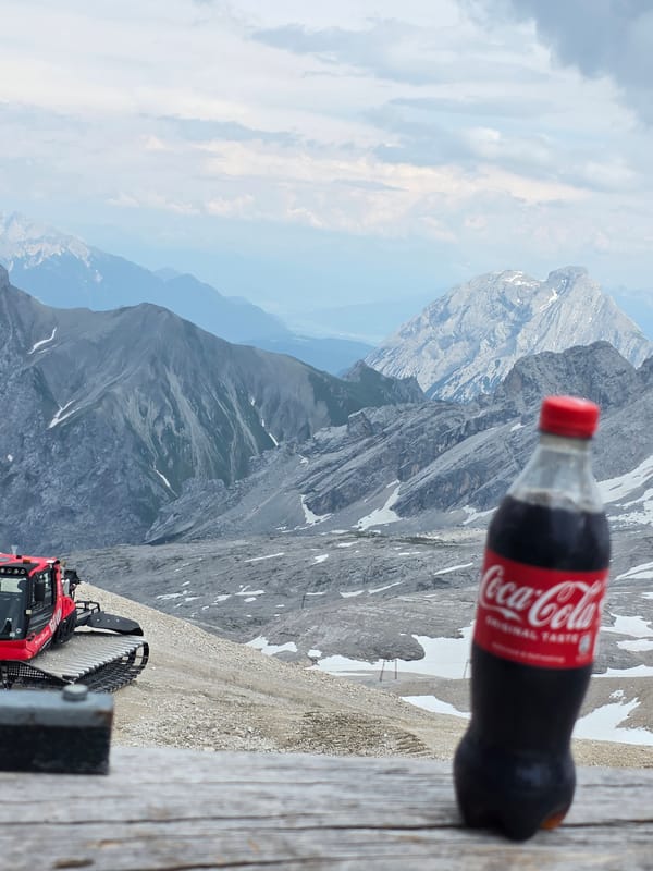 Coca-Cola bottle meets Alpine peaks above Garmisch-Partenkirchen