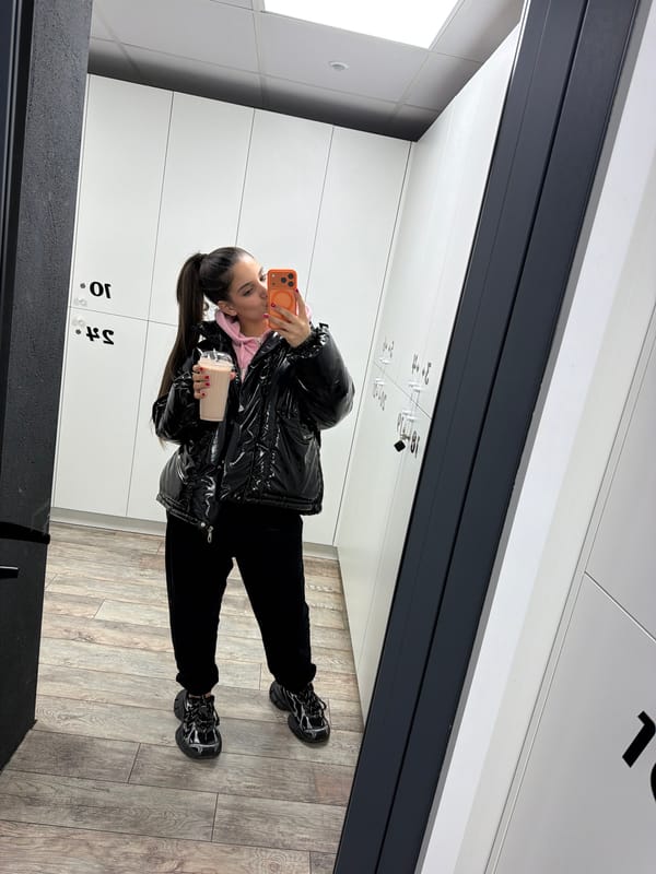 Woman takes selfies in Pernik locker room facility