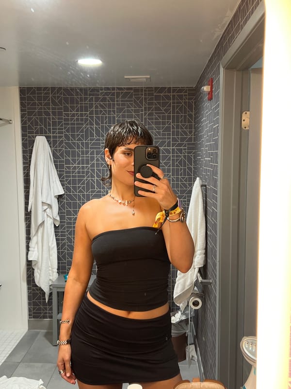 Woman Takes Selfie in Modern Bathroom in La Quinta