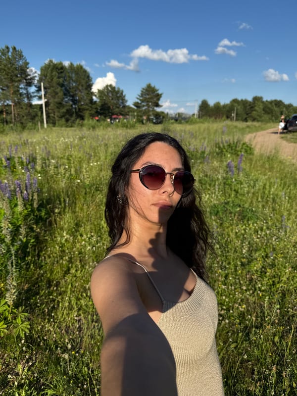 Relaxing in a wildflower field under blue summer skies