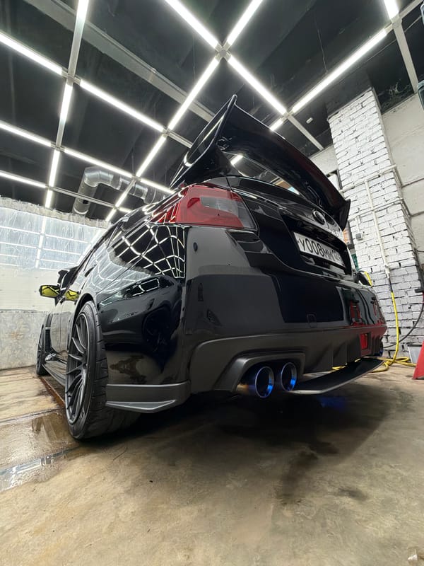 Car detailing session photographed in Krasnoyarsk indoor facility