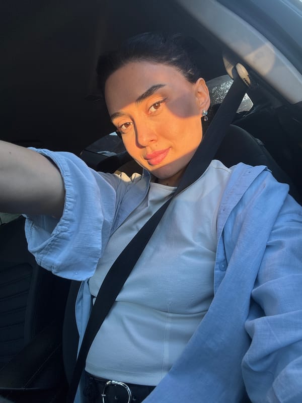 Woman Takes Multiple Car Selfies in Tbilisi