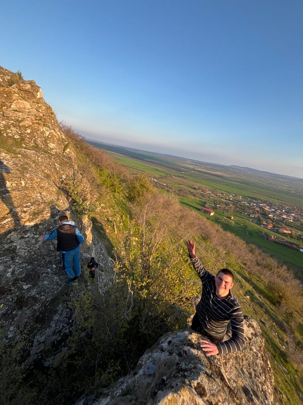 Two men photographed on rocky outcrop near Goritsa, Bulgaria