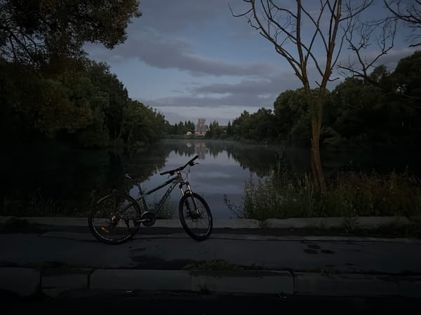 Evening bike ride winds down by the water in rural Russia