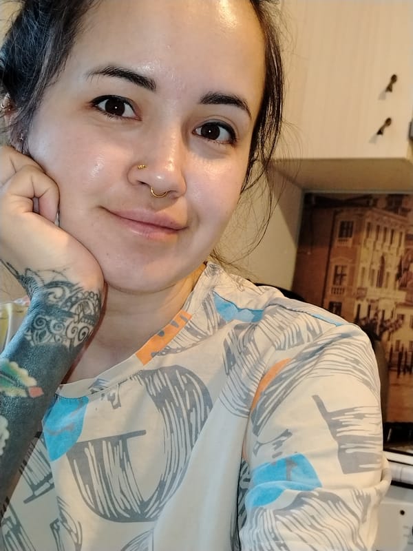 Woman photographed in kitchen late night in Noviy, Russia