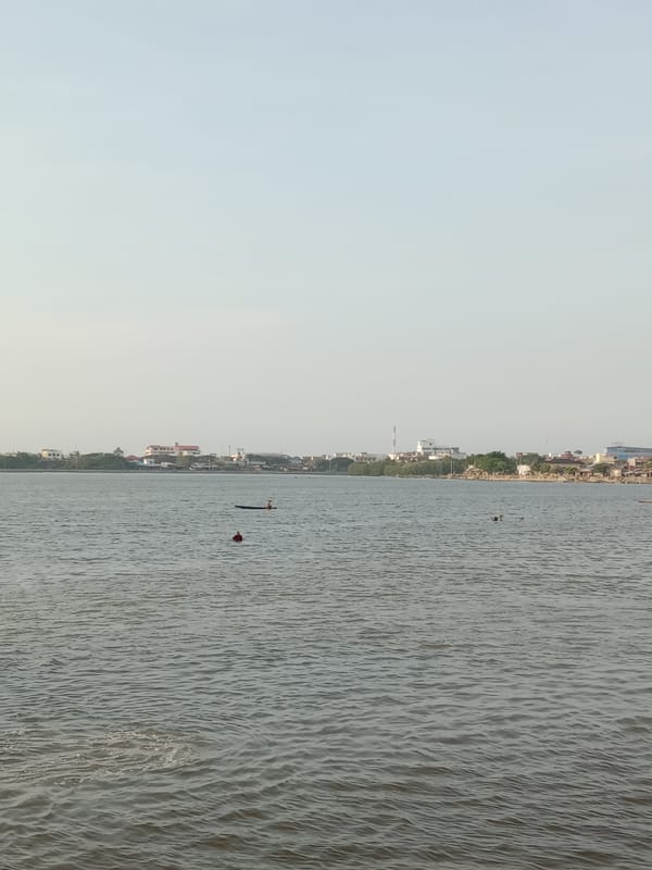 Daily waterfront life documented in Lhokseumawe, Indonesia