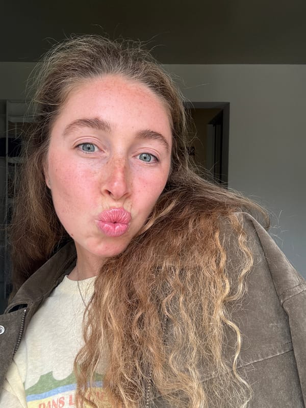 Woman takes selfies in Madrid residential setting