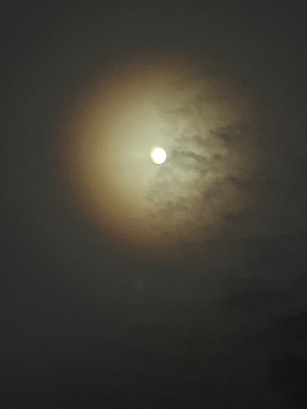 Moon observed through clouds over Pchelnik, Bulgaria