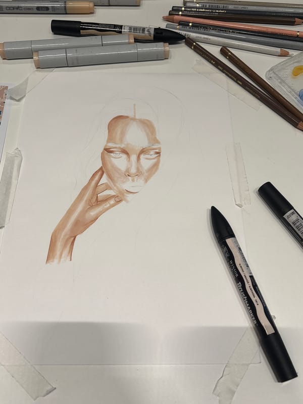 Artist works on portrait drawing in Milan studio