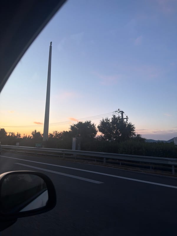 Nighttime highway drive documented near Koropi, Greece
