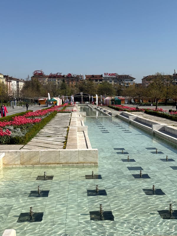 Sunny morning captured at Sofia urban plaza with water feature