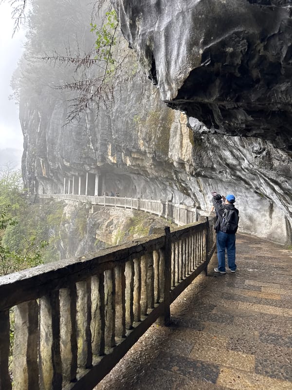 Early morning tourism activity in Wulong District's scenic canyons