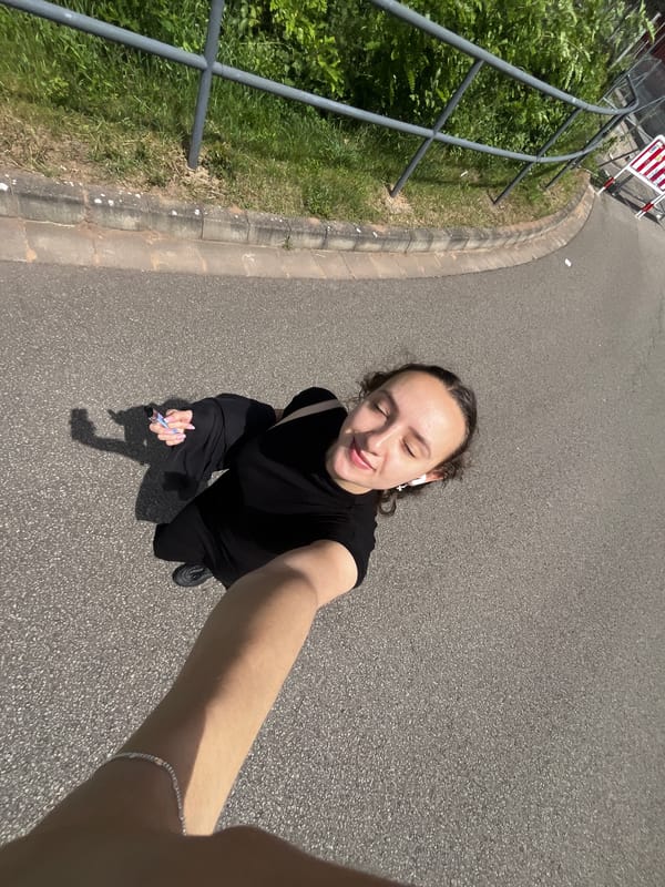 Woman takes selfie on street in Saarbrücken