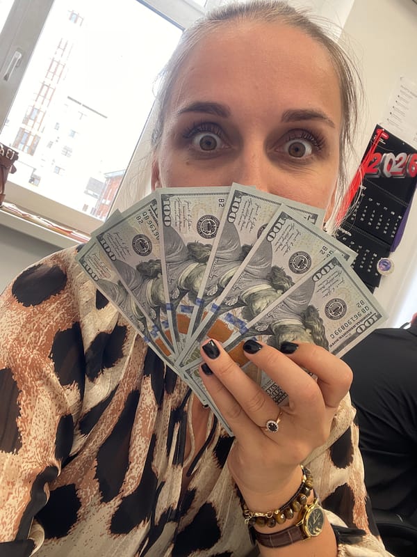 Woman displays $500 cash in Perm, Russia