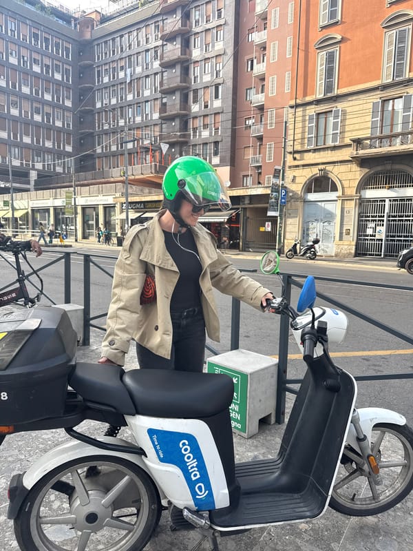 Cooltra scooter rider spotted in Milan wearing lime helmet