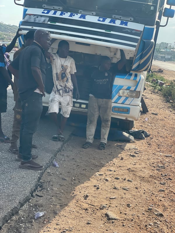 Damaged JIFFA truck draws crowd in Lokoja, Nigeria