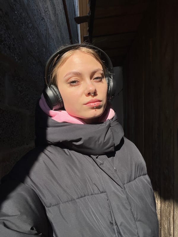 Person rests in morning sunlight near Foki, Russia