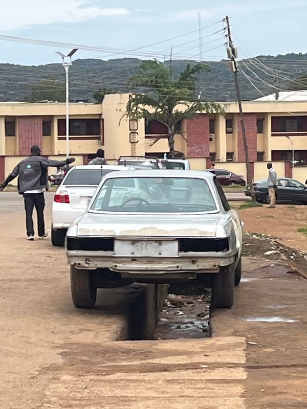 Street life and vehicle scenes across two Nigerian neighborhoods