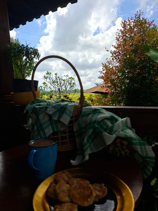 Early morning meal of homemade potato pancakes documented in Lodtunduh