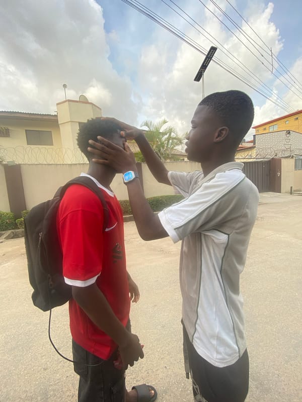 Ordinary street life documented in Lagos residential area Friday