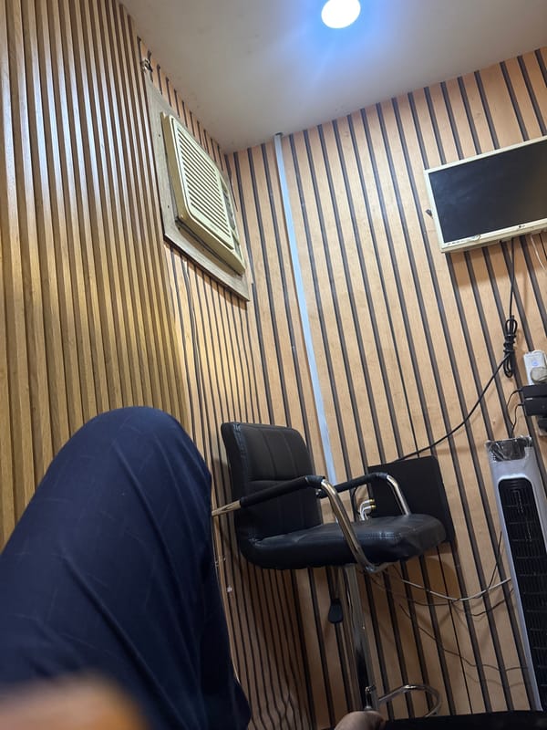 Indoor room with wooden walls documented in Lokoja, Nigeria