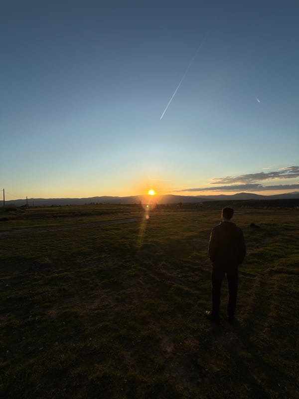 Person enjoys sunset moment in Bulgarian countryside near Blagoevgrad