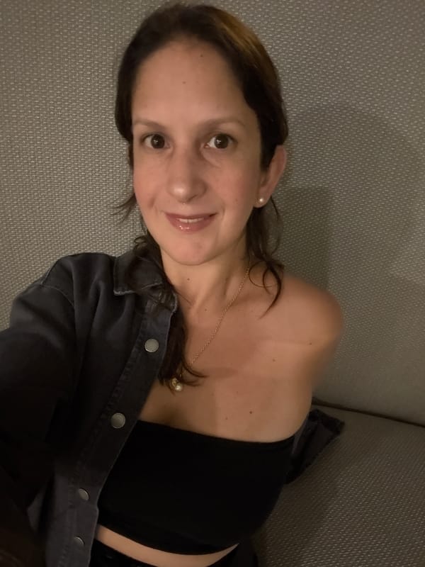 Woman photographed in couch and elevator scenes, San Isidro